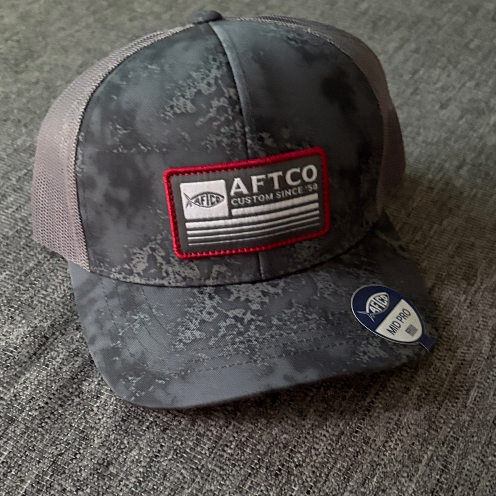 AFTCO Charcoal and Black Hat never worn